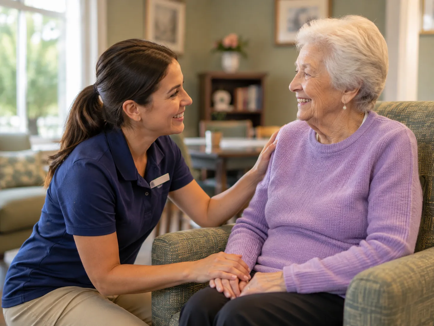 Dementia-trained caregiver connecting with a memory care resident